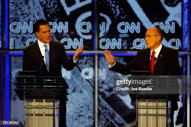 Former Massachusetts governor Mitt Romney and former New York City Mayor Rudy Giuliani, debate during the CNN-YouTube Presidential Debate at the...