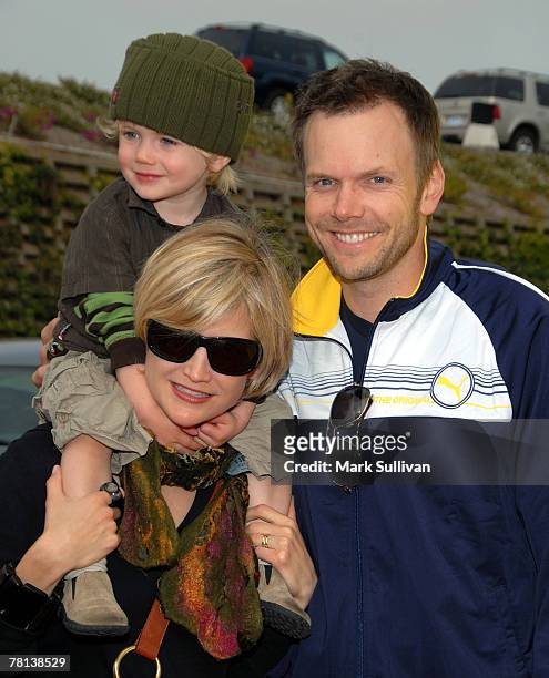 Television host/actor Joel McHale with Sarah Williams and child arrive at the P.S. ARTS Annual "Express Yourself" charity benefit held on November 4,...