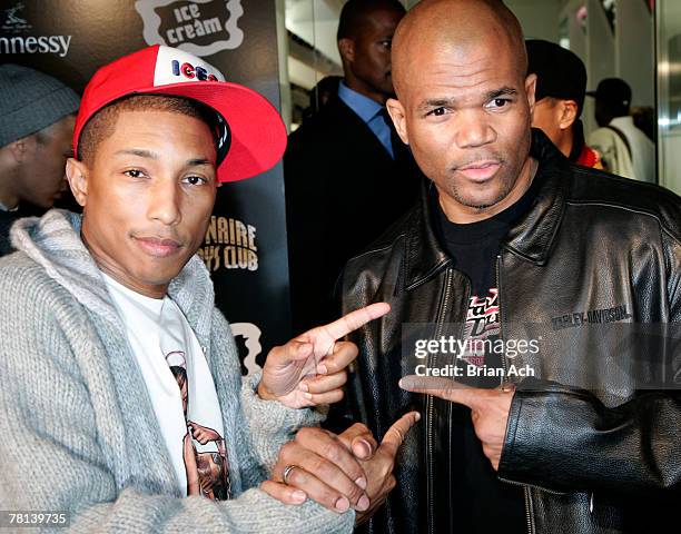 Musician Pharell Williams with rapper DMC aka Darryl McDaniels at the Billionaire Boys Club / Ice Cream Flagship Store Opening on November 28 in New...