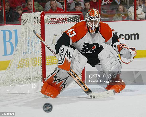 Martin Biron of the Philadelphia Flyers watches the puck sail wide during their game against the Carolina Hurricanes on November 28, 2007 at RBC...