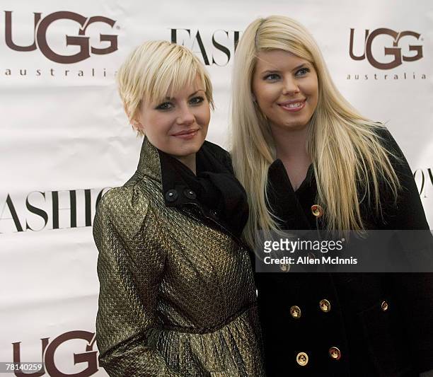 Elisha Cuthbert and her sister Lee Ann Cuthbert arrive at the opening of the UGG Australia Boutique November 28 2007 in Montreal Quebec.