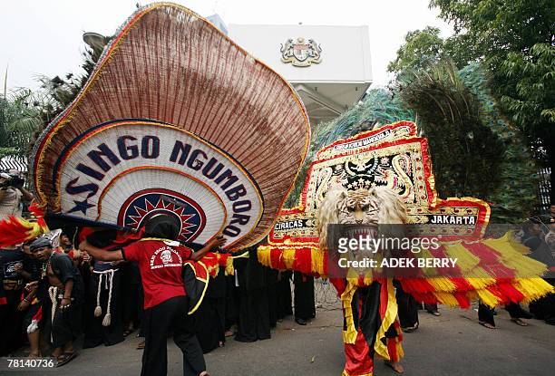 Reog Ponorogo dancers perform a dance during a protest outside Malaysia's embassy in Jakarta, 29 November 2007. Hundreds of Indonesian dancers of...