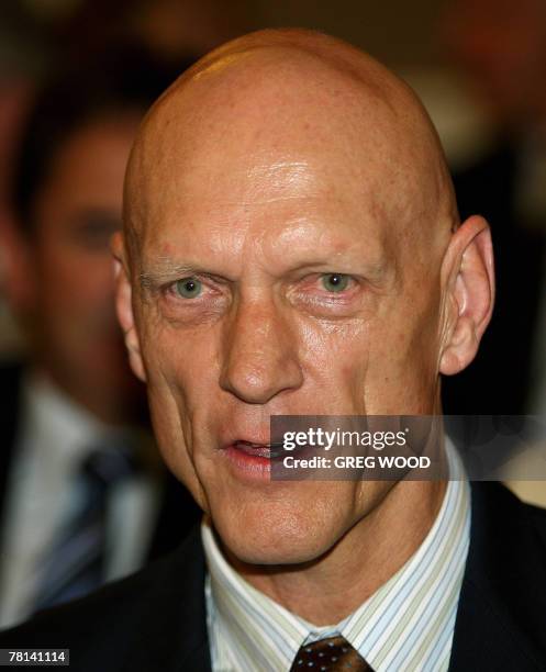 Former rock group Midnight Oil frontman Peter Garrett attends the Australian Labor Party's first caucus meeting in Canberra, 29 November 2007....