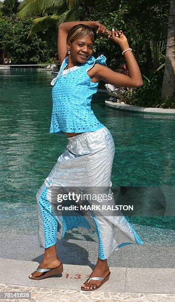 Miss World Pageant contestant Fatmata B Turay from Sierra Leone poses for photos at Yalong Bay in Sanya, 29 November 2007. The 57th Miss World...
