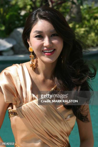 Miss World Pageant contestant Eun-Ju Cho of Korea poses for photos at Yalong Bay in Sanya, 29 November 2007. The 57th Miss World Pageant returns to...