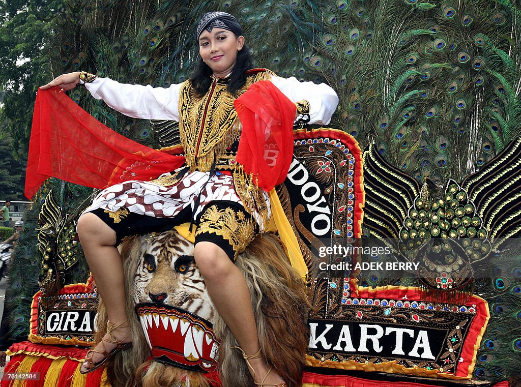 A Reog Ponorogo dancer performs on the "