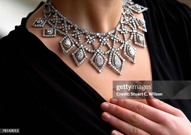 Laura Turnball wears a GBP250,000 Cartier Diamond Necklace previously owned by Anne Moen Bullitt, which is to be auctioned at Bonhams, New Bond...