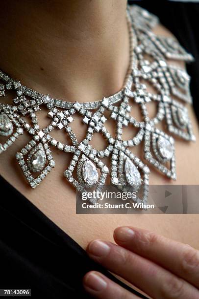 Laura Turnball wears a GBP250,000 Cartier Diamond Necklace previously owned by Anne Moen Bullitt, which is to be auctioned at Bonhams, New Bond...