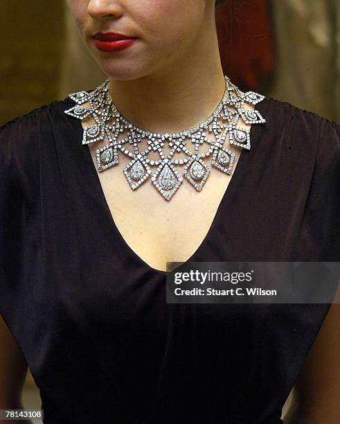 Laura Turnball wears a GBP250,000 Cartier Diamond Necklace previously owned by Anne Moen Bullitt, which is to be auctioned at Bonhams, New Bond...