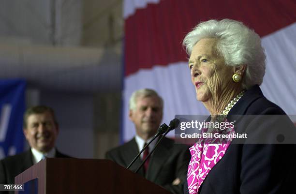 Senator John Ashcroft, R-MO, left, and former U.S. Senator John Danforth, listen to former first lady Barbara Bush, while she spoke at a republican...