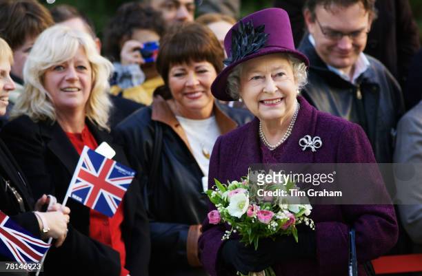 Queen Elizabeth II meets locals during a walkabout in the centre of Milton Keynes at 'thehub:mk' a newly built mixed-use development with a central...