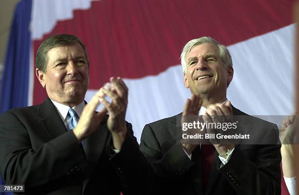 Senator John Ashcroft, R-MO, left, and former U.S. Senator John Danforth, clap for former first lady Barbara Bush at a republican rally October 26 ,...