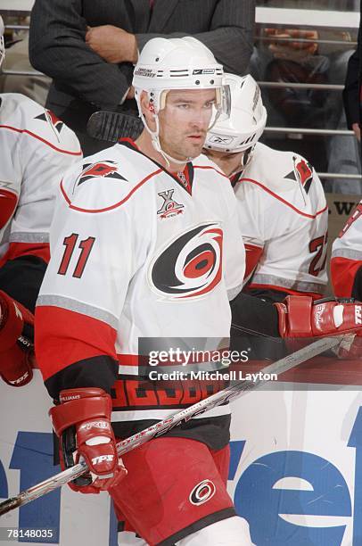 Justin Williams of the Carolina Hurricanes looks on during the NHL game against the Washington Capitals on November 24, 2007 at the Verizon Center in...