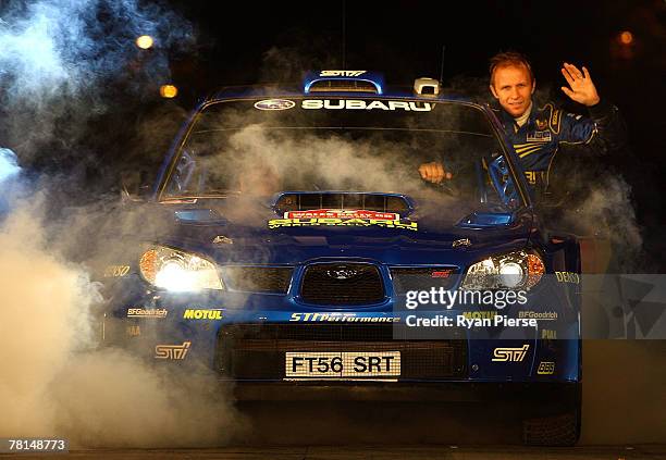 Petter Solberg and Norway and Subaru waves to the crowd during the Ceremonial Start for the 2007 FIA Wales Rally GB on November 29, 2007 in Cardiff,...