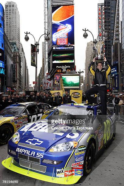 Jimmie Johnson, the 2007 NASCAR Nextel Cup Champion, poses on Military Island in Times Square during NASCAR Champions Week November 29, 2007 in New...