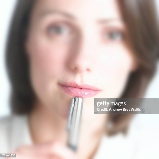 pensive businesswoman - looking closely stock pictures, royalty-free photos & images