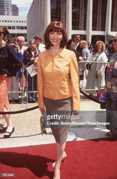 Victoria Principal poses for photographers at the NBC Primetime Upfront presentation at the Metropolitan Opera House in New York City May 15, 2000....