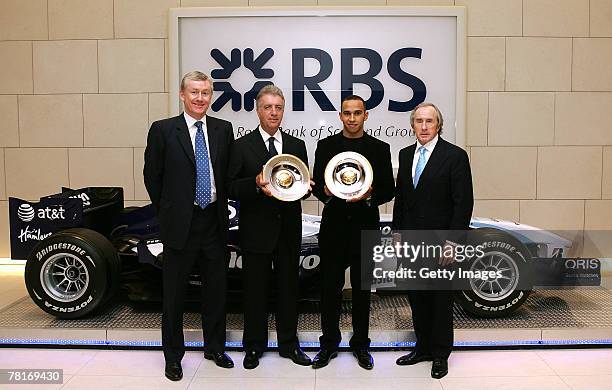 Piero Ferrari with the RBS Jackie Stewart Lifetime Achievement Award in Motorsports which he received on behalf of Ferrari and Lewis Hamilton with...