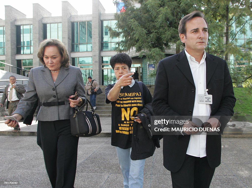 Juan Carlos Lecompte (R), husband of for