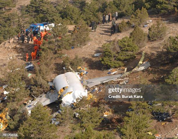 The wreckage of AtlasJet Airline MD-83 lies on the hills near Cukuroren village in Isparta province, central Turkey, November 30, 2007 as rescue...