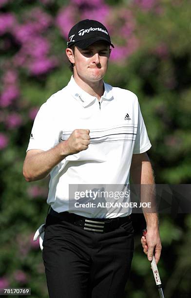 Justin Rose of England celebrates a birdie on the 18th hole on day 2 of Nedbank Golf Challenge in Sun City, 30 November 2007. Rose ended the day with...