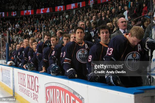The Edmonton Oilers stand for the National Anthem before the game against the Columbus Blue Jackets at Rexall Place on November 26, 2007 in Edmonton,...