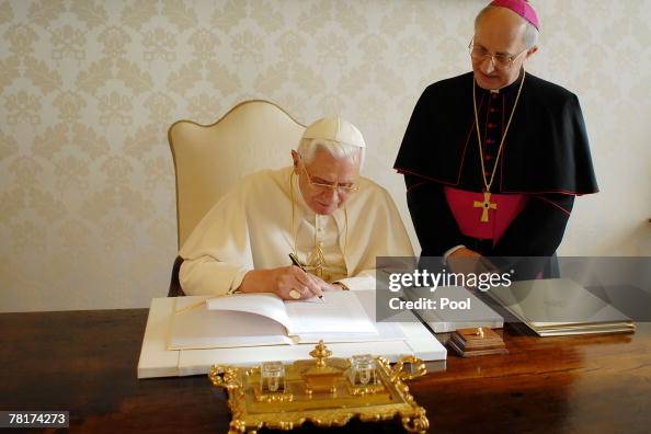 Pope Benedict XVI signs his second encyclical of his pontificate