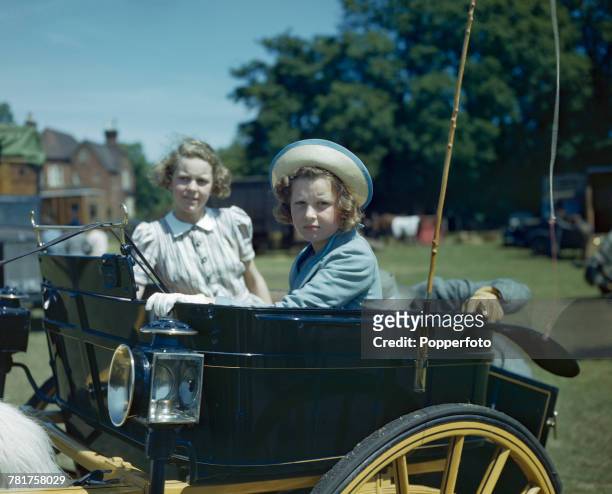 Princess Alexandra of Kent pictured in a trap carriage at the Royal Windsor Horse Show in Windsor, England in June 1944.