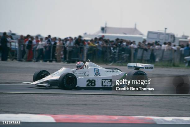 Swiss racing driver Clay Regazzoni drives the Albilad-Saudi Racing Team Williams FW07 Ford Cosworth DFV 3.0 V8 to finish in first place to win the...
