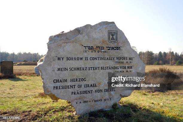 Memorial stone, dedicated by Israeli President Chaim Herzog in 1987, with quotes from the Psalms, at the site of the former Bergen-Belsen German Nazi...