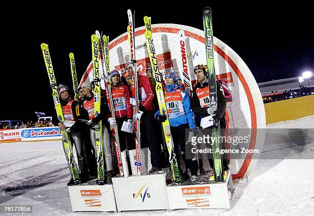 Roar Ljoekelsoey, Bjoern Einar Romoeren, Tom Hilde, and Anders Bardal of Norway take first place, Wolfgang Loitzl, Martin Koch, Gregor...