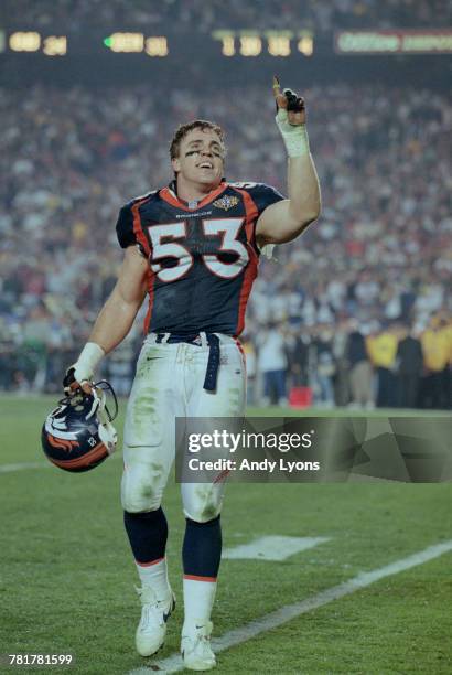 Bill Romanowski, Linebacker for the Denver Broncos celebrates winning the National Football League Super Bowl XXXII game against the Green Bay...