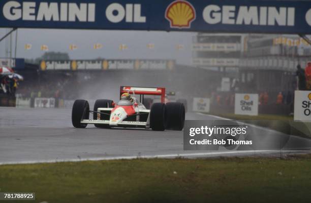 Brazilian racing driver Ayrton Senna drives the Honda Marlboro McLaren McLaren MP4/4 Honda RA168E 1.5 V6t to finish in first place to win the 1988...