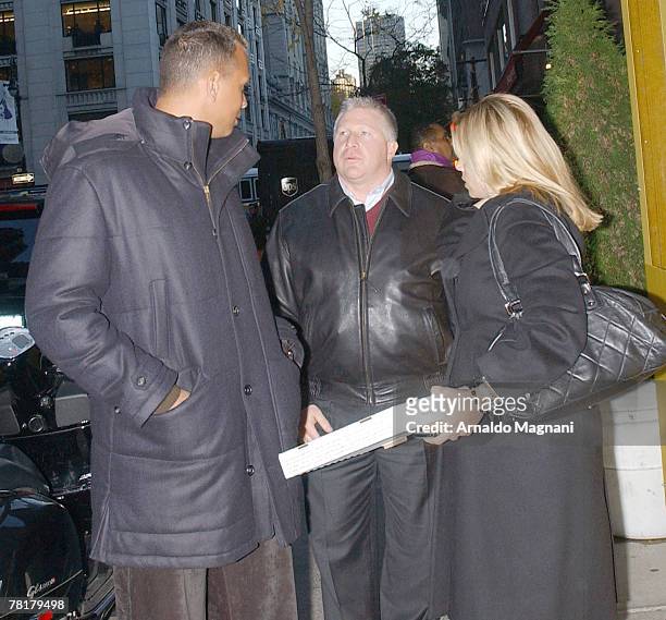 Third Baseman for the New York Yankees Alex Rodriguez and wife Cynthia Scurtis walk down the street after leaving Serafina November 30, 2007 in New...