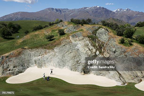 Marco Soffietti of Italy plays out of the bunker on the 17th hole during the third round of the New Zealand Open December 1, 2007 in Queenstown, New...