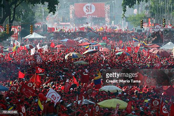 Supporters of Venezuela's President Hugo Chavez attend a rally supporting a referendum on changes to the Constitution introduced by Chavez November...