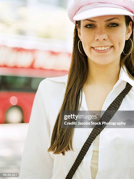 smiling woman - headware stock pictures, royalty-free photos & images