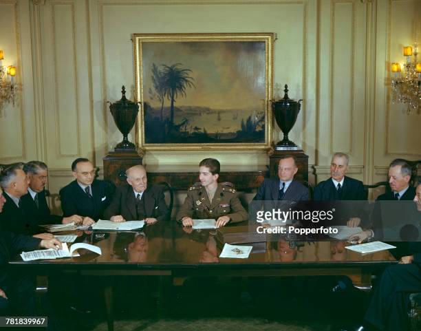 King Peter II of Yugoslavia pictured seated in centre at a conference table with members of his cabinet government in exile in London in May 1943....