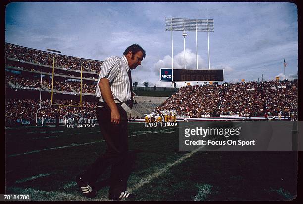 S: John Madden head coach of the Oakland Raiders, paces the sideline during a circa 1970s NFL game against the Pittsburgh Steelers at the Oakland...