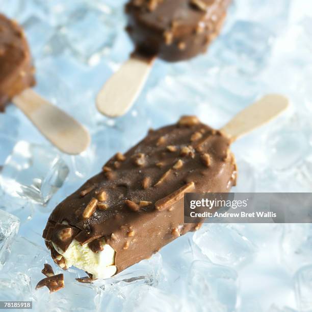 ice cream bars on ice - convenience chocolate stock pictures, royalty-free photos & images