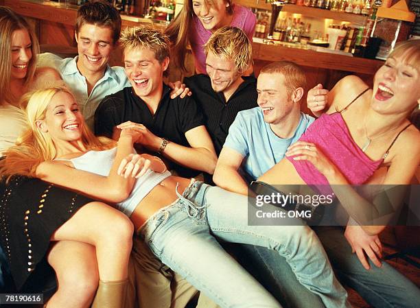 friends in a bar - messy boyfriend stock pictures, royalty-free photos & images