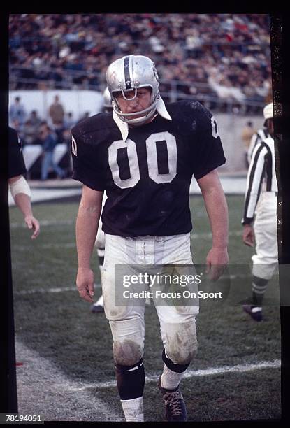 S: Center Jim Otto of the Oakland Raiders, on the sidelines during a early circa 1970's NFL football game at the Oakland Coliseum in Oakland,...