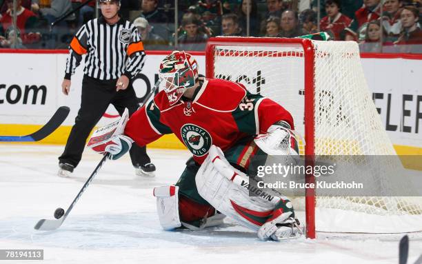 Niklas Backstrom of the Minnesota Wild blocks a shot against the St. Louis Blues during the game at Xcel Energy Center November 30, 2007 in St. Paul,...