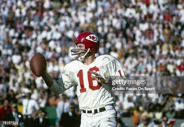 S: Quarterback Len Dawson of the Kansas City Chiefs scrambles against the Boston Patriots during a circa 1960's NFL football game. Dawson played for...