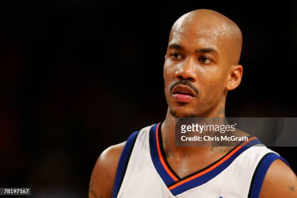 Stephon Marbury of the New York Knicks watches on against the Milwaukee Bucks on November 30, 2007 at Madison Square Garden in New York City. The...