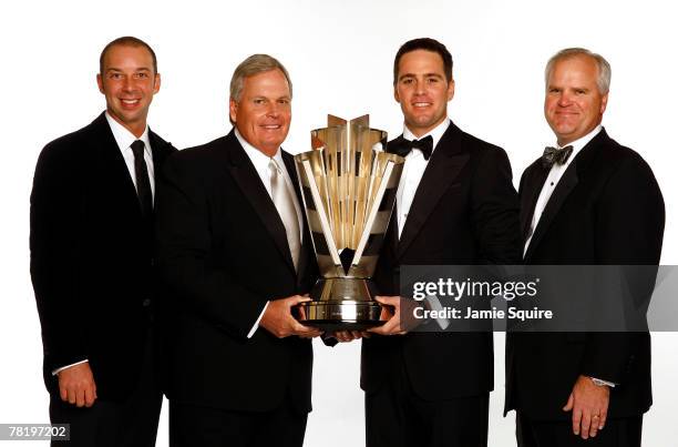 Crew chief Chad Knaus, poses with team owner Rick Hendrick, Jimmie Johnson, the 2006 NASCAR Nextel Cup Series Champion, and Robert Niblock, Lowe's...