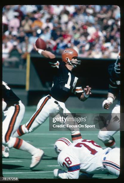 S: Ken Anderson of Cincinnati Bengals, throws a pass against the Boston Patriots during circa 1970's NFL football game at Riverfront Stadium in...