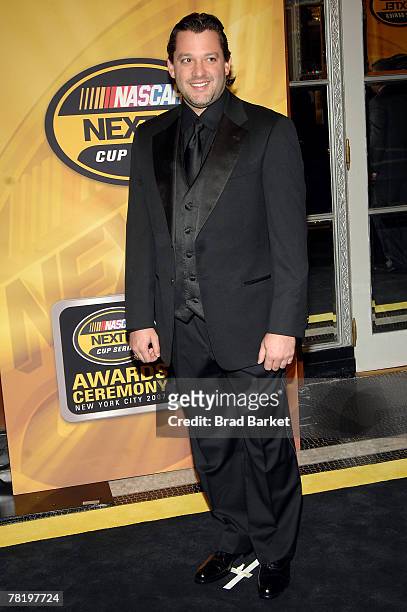 Tony Stewart, driver of the The Home Depot Chevrolet, arrives at the NASCAR Nextel Cup Series Awards Ceremony at The Waldorf Astoria on November 30,...