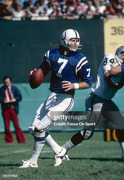 Bert Jones of the Baltimore Colts drops back to pass in a circa mid 1970's NFL game against the Oakland Raiders in Baltimore, Maryland. Jones played...