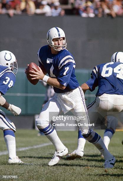 Bert Jones of the Baltimore Colts drops back to pass in a circa mid 1970's NFL game against the Oakland Raiders in Baltimore, Maryland. Jones played...